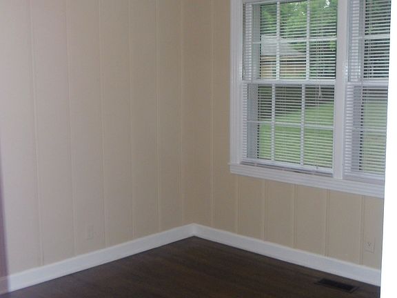 One of three bedrooms