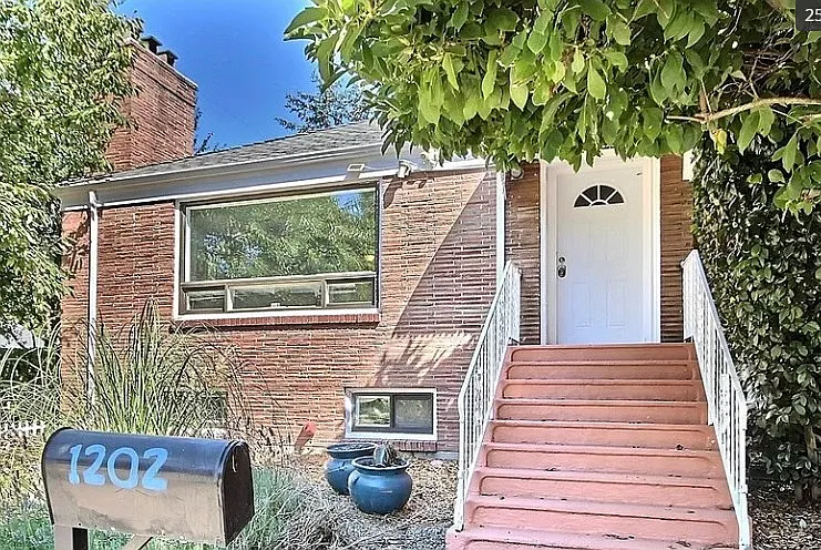 Older Photo, New windows, door & landscape maintenance. Mail is direct drop from USPS through wall mail slot.