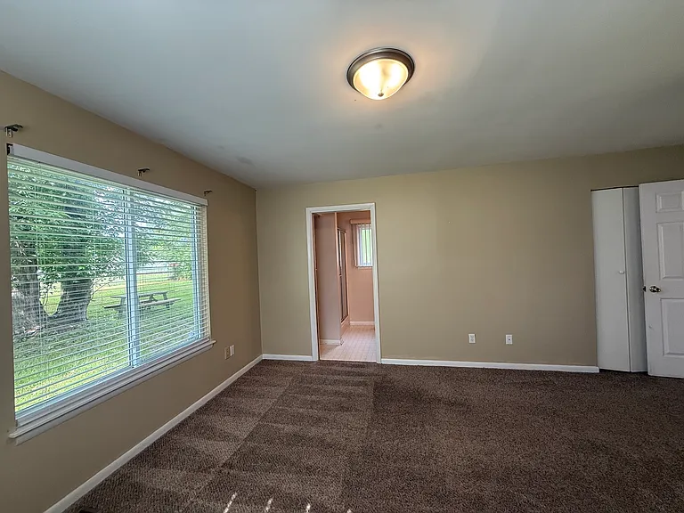 6310-Master Bedroom, view of back yard, straight ahead is the Master Bath