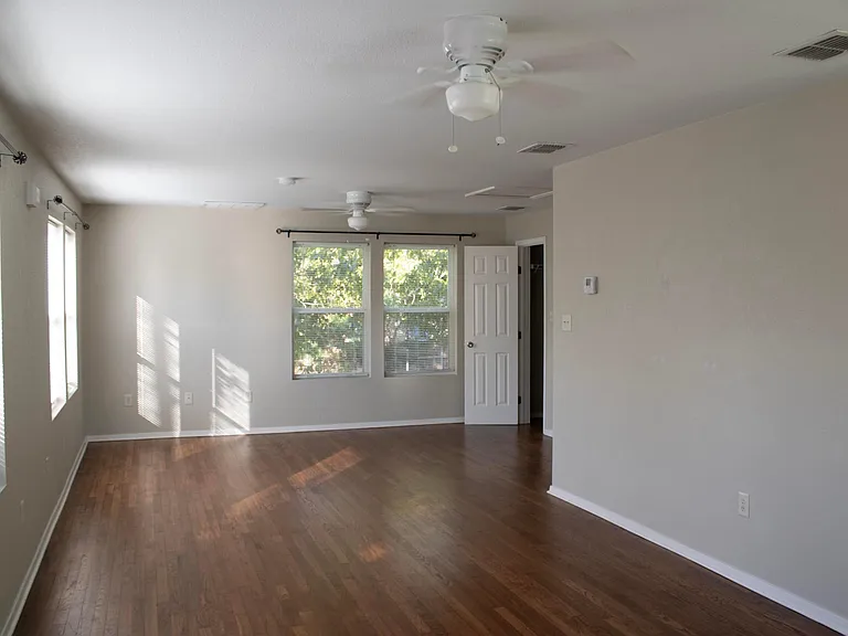 Main living space, original hardwood floors