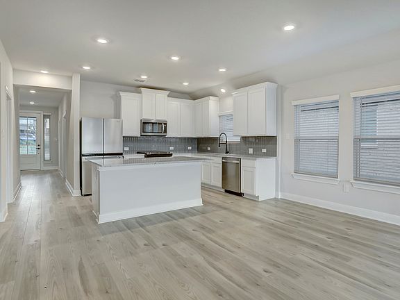 The dining room sits right off of the kitchen.