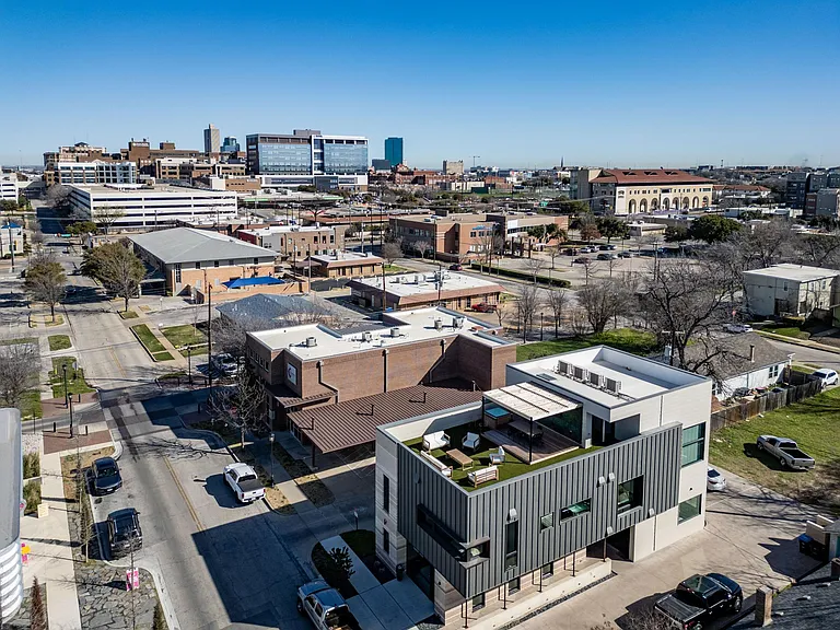 Aerial view of the apartment building and the shared roof top terrace.