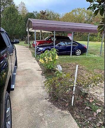 2 carport and front driveway