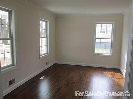 Living Room
						:
						Tray Ceiling & Chair Rail