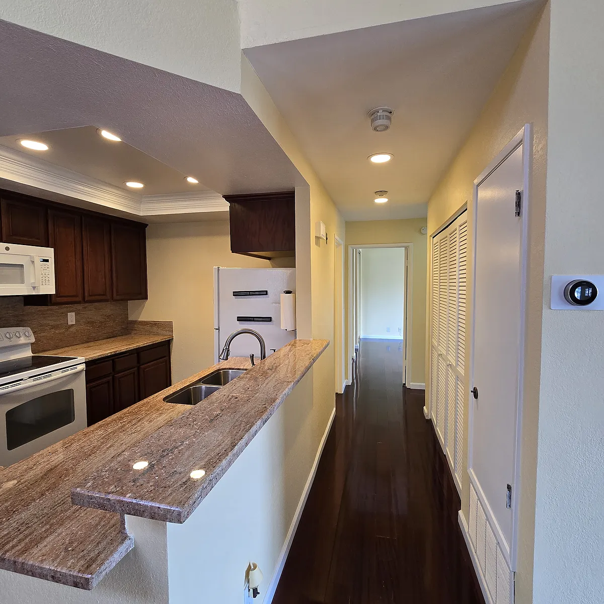 Kitchen, Hallway - 6304 Buena Vista Dr #C
