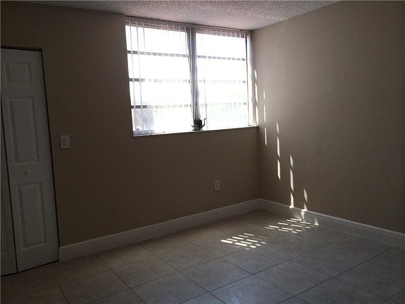 2nd image of 4449 W 10th Ct #B