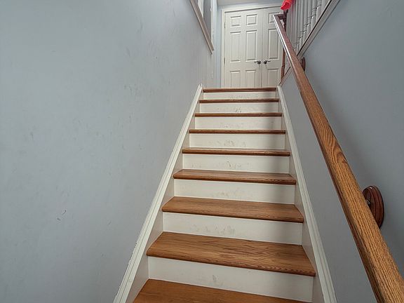 Walking up the stairs into the unit