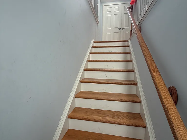 Walking up the stairs into the unit