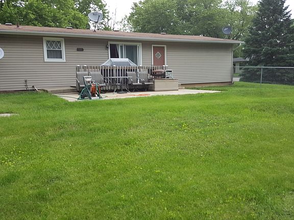 fenced in back yard w/ deck