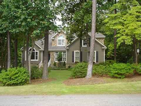 Quiet Cul de sac location with 20 azaleas in front