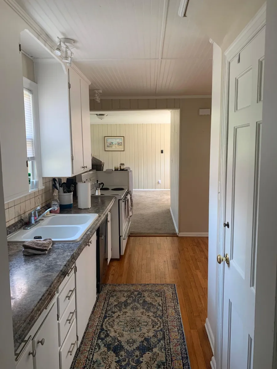 Looking into kitchen and 2nd living room from dining area - 5323 Fairway Rd