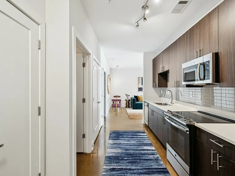 1 Bedroom Apartment Kitchen with Stainless Steel Appliances at The Melrose Apartments in Berry Hill, Tennessee