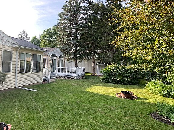 Back of home and backyard