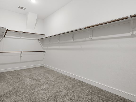 Huge primary walk-in closet