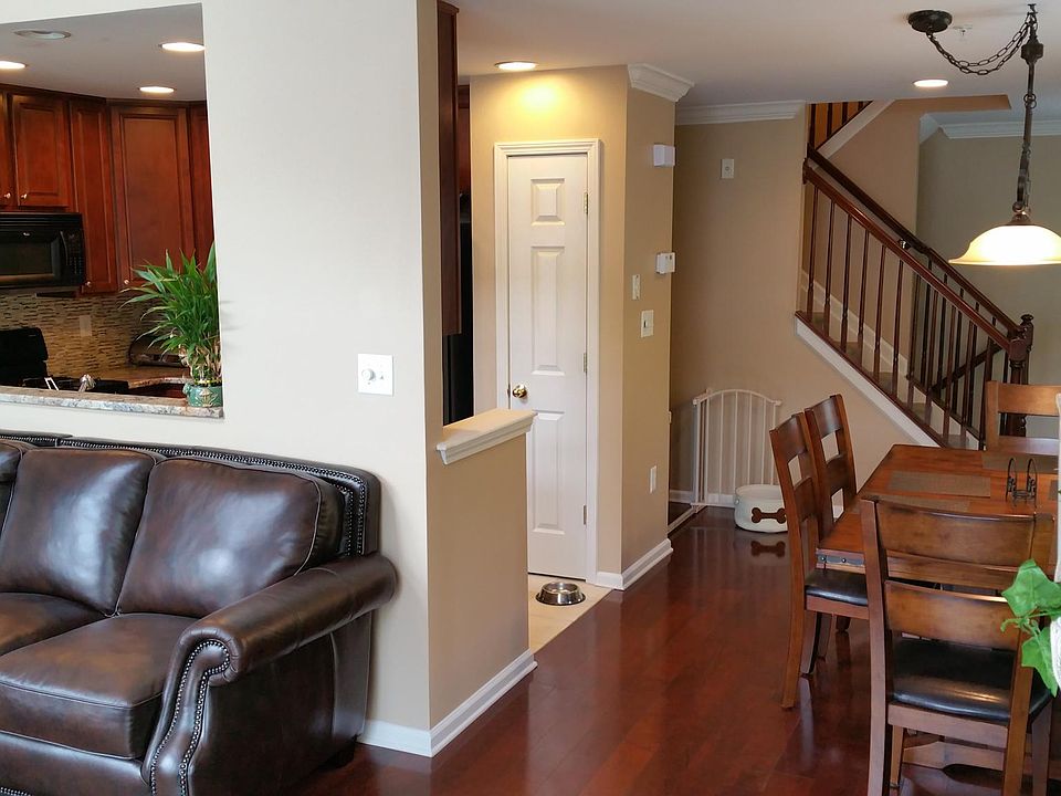 Dining, living, and kitchen areas combine to form a great open layout for entertaining.