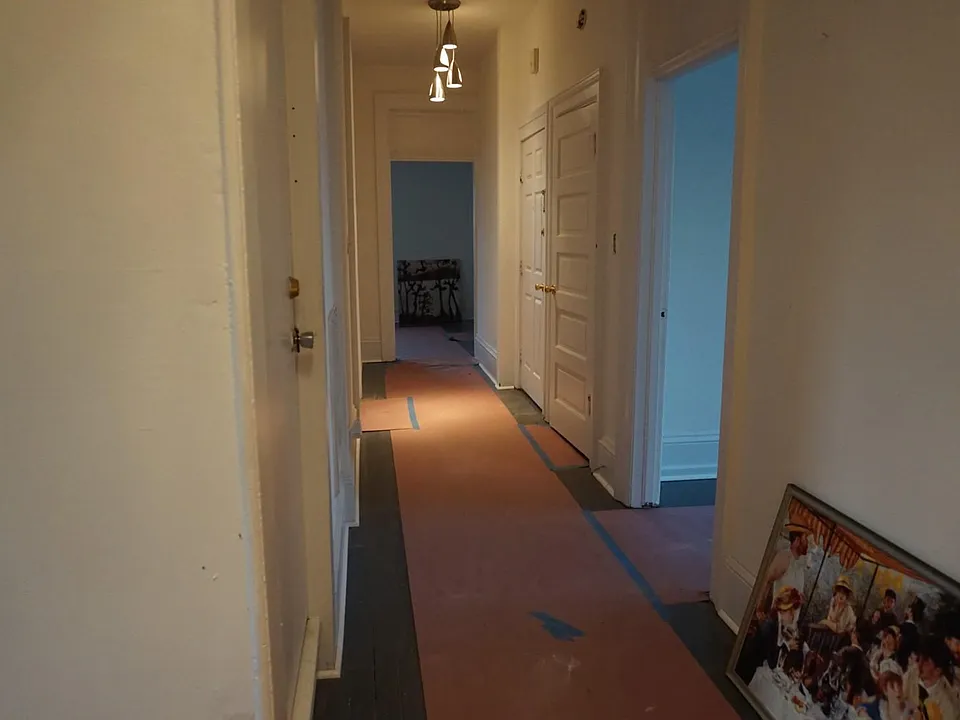 Hallway View Towards the Bathroom and Kitchen