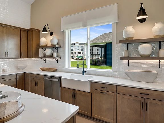 Kitchen with white apron-front sink