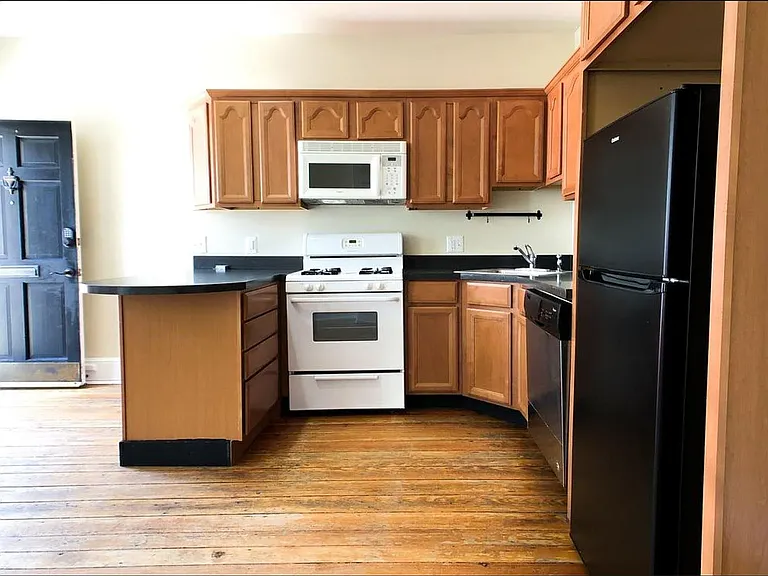 The kitchen has been upgraded with new stainless steel appliances - oven, refrigerator, dishwasher, and microwave. Updated listing photos coming soon!