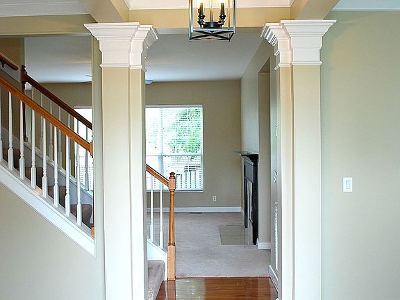 Gorgeous entry foyer with finished hard wood floors