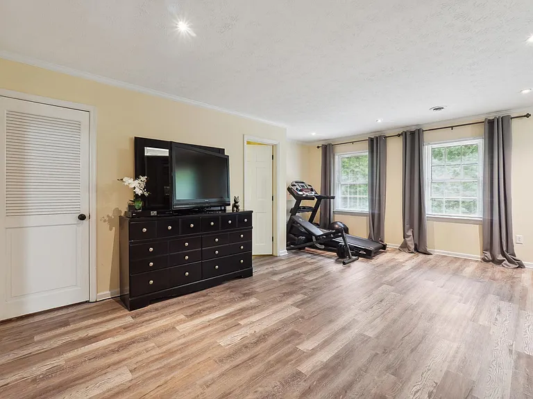 Bedroom #1 Master King with TV & workout area -Upstairs Level