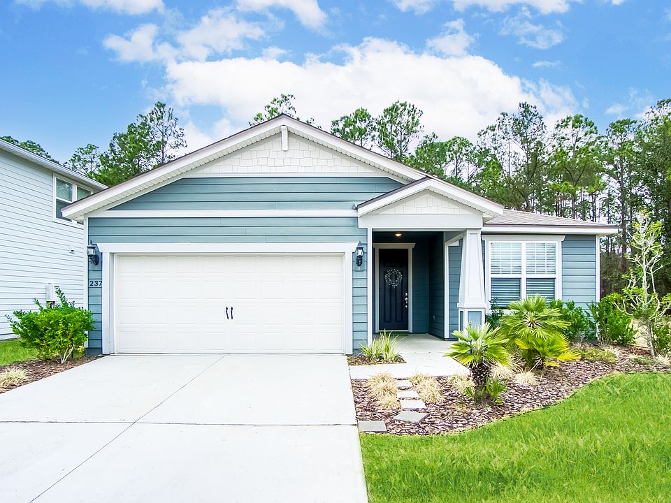 one story house with attached garage.