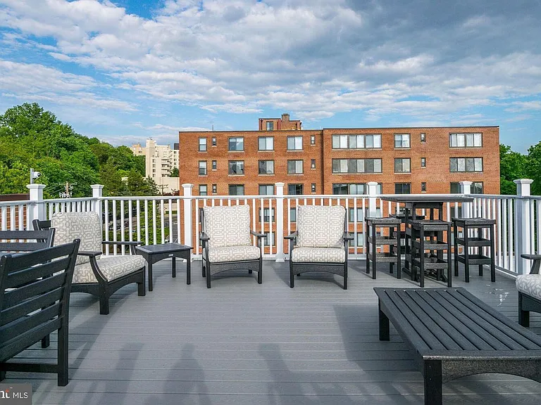 Roof deck offers views of verdant Glover Park.