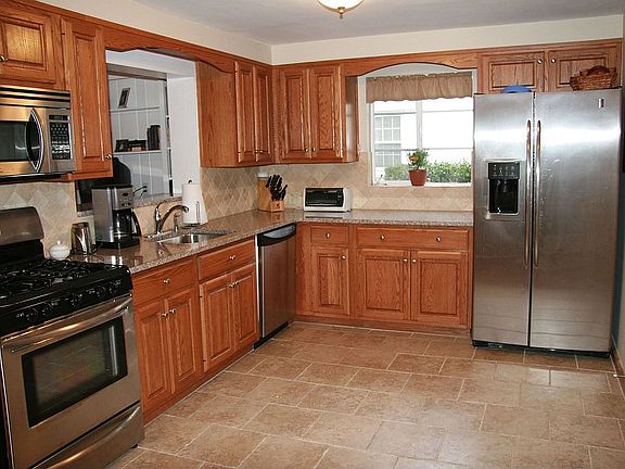 Kitchen with Granite Countertops and Stainless Steal Appliances