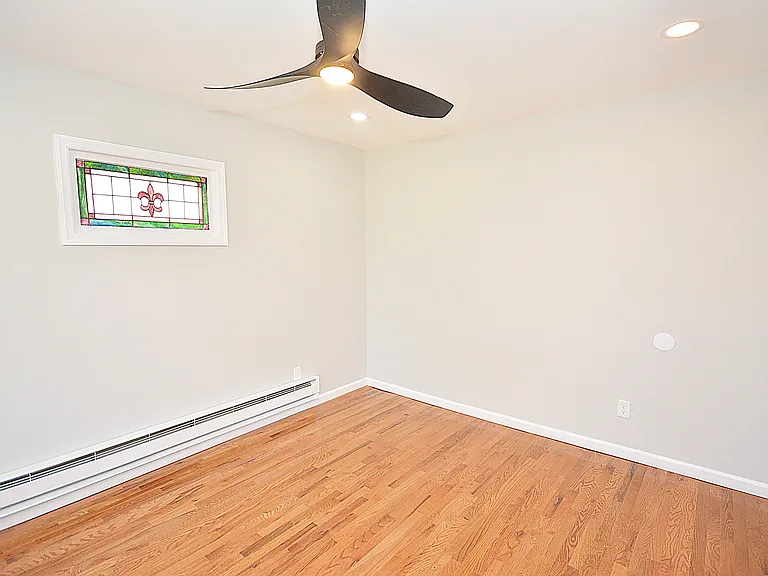 Bedroom - wall opposite the bay windows.
