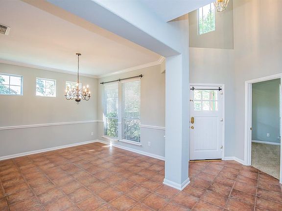 Trademark craftsman door builds on the character of this home. Upon entry, the dining sits to the right and a study or 5th bedroom sits to the left.