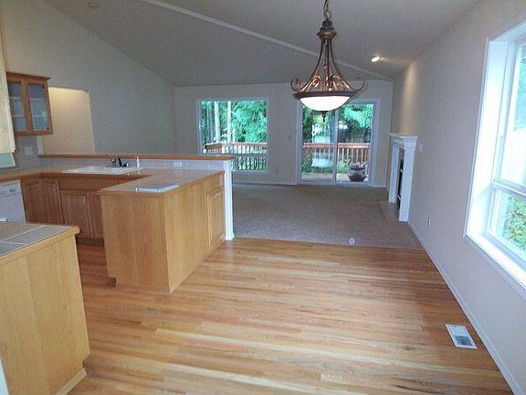Dining area as seen from the living room and looking toward the family room.