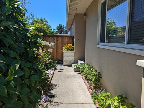 Entry way to the house with beautiful flowers