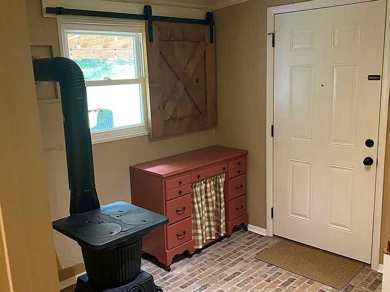 (1 of 3) Rear entrance/ mud room.