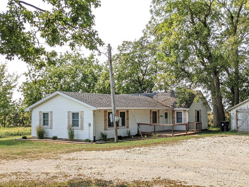 Sit out on the front deck where you can enjoy the view of the walnut grove in the spring and summer.