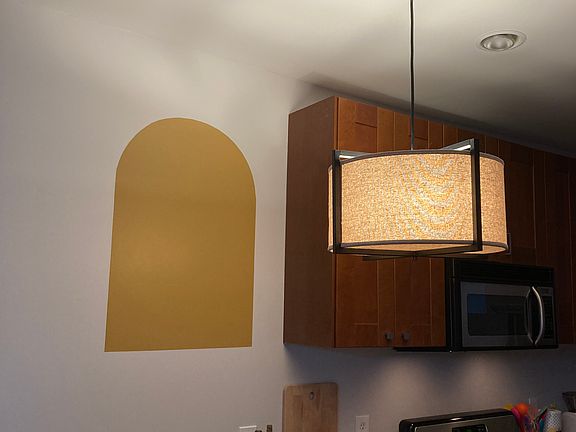kitchen with updated light/paint - yellow paint has shelves now