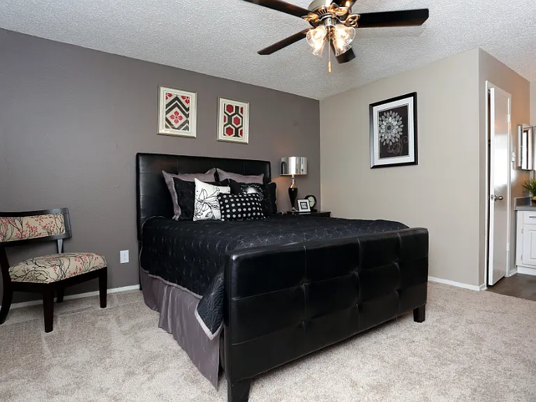 Large bedroom with modern finishes and neutral color palette