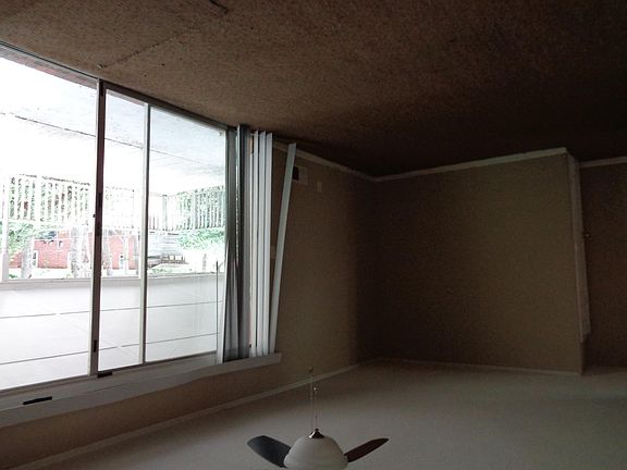 Den with sliding doors