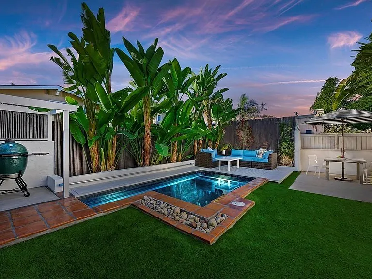 A view of the beautiful cocktail-sized pool in the backyard