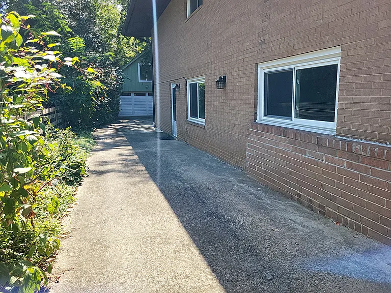 Driveway/enterance to the apartment - The garage is at the end of the driveway.