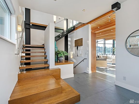 Step into this impressive home with meticulous finishing throughout including low voltage lighting with control panels in every room. 