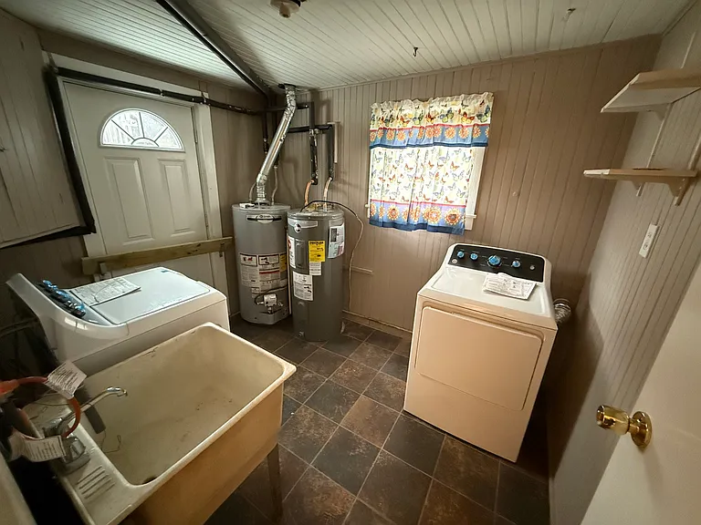 Laundry room with NEW washer and dryer
