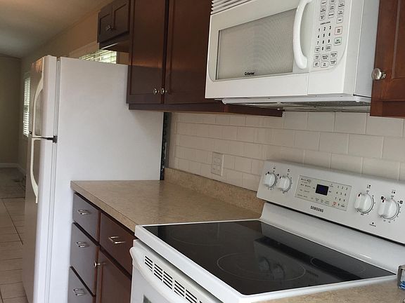Microwave vent hood and self-cleaning oven.