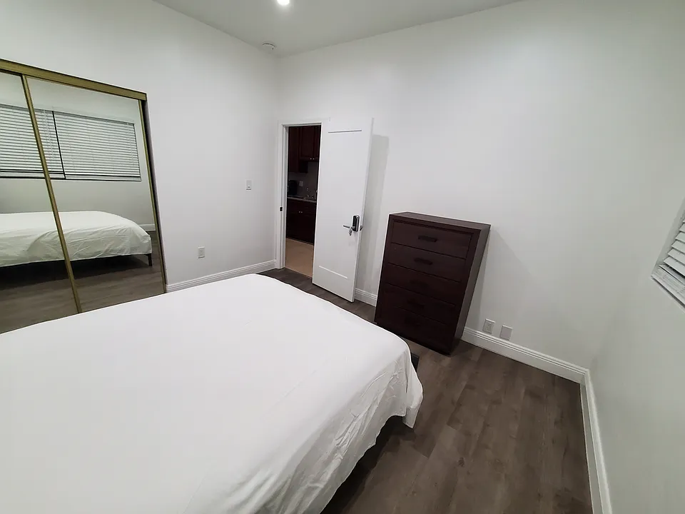 Bedroom 3 view from back to front entry