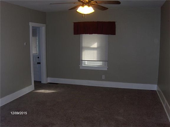 Living room. Door off living room leads to balcony.