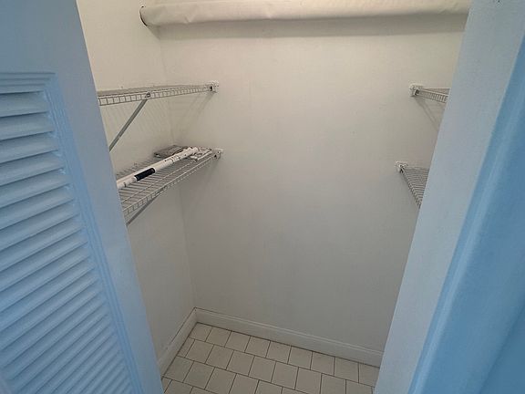 Pantry across from kitchen