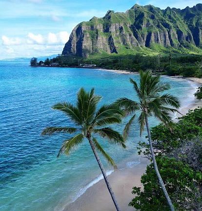 Kaaawa sits between the turqoise ocean and spectacular Kauloa mountain range.