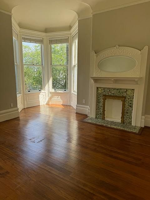 huge family/living room with turret windows at front of house -