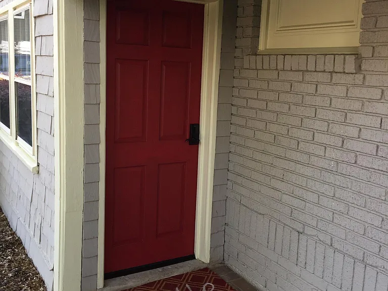 covered rear digital locked rear door to enter at back from parking lot. front entrance also from front at street