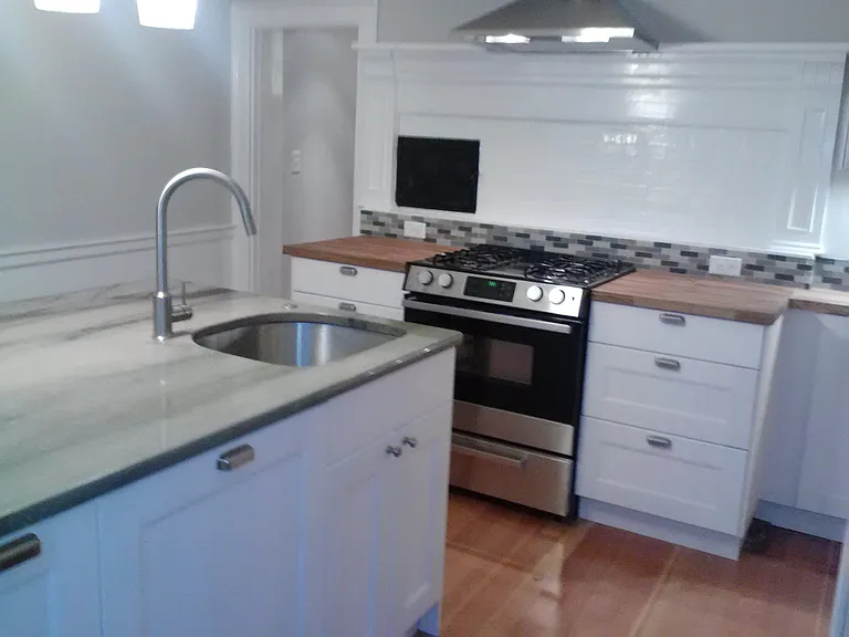KITCHEN ISLAND VIEW WITH BUILT-IN DISHWASTER