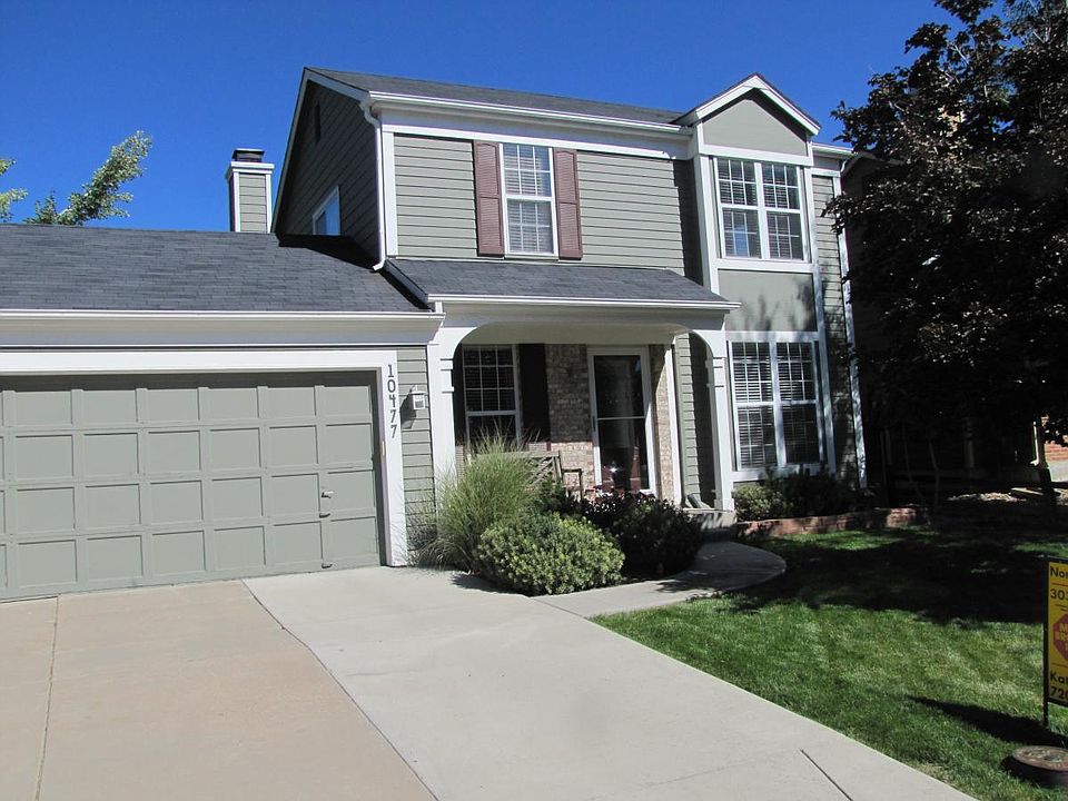Front yard with attached garage