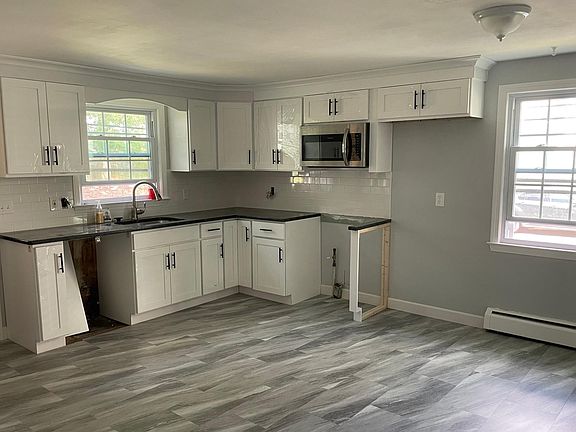 renovated kitchen, stainless steel appliances forthcoming including dishwasher